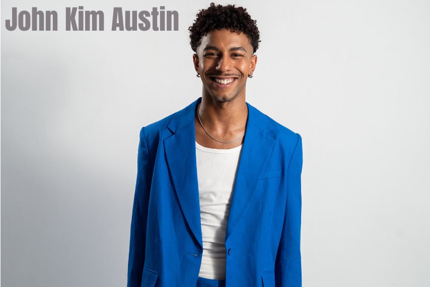 AI-generated illustration of a smiling man in a bright blue blazer over a white top against a white background, captioned John Kim Austin