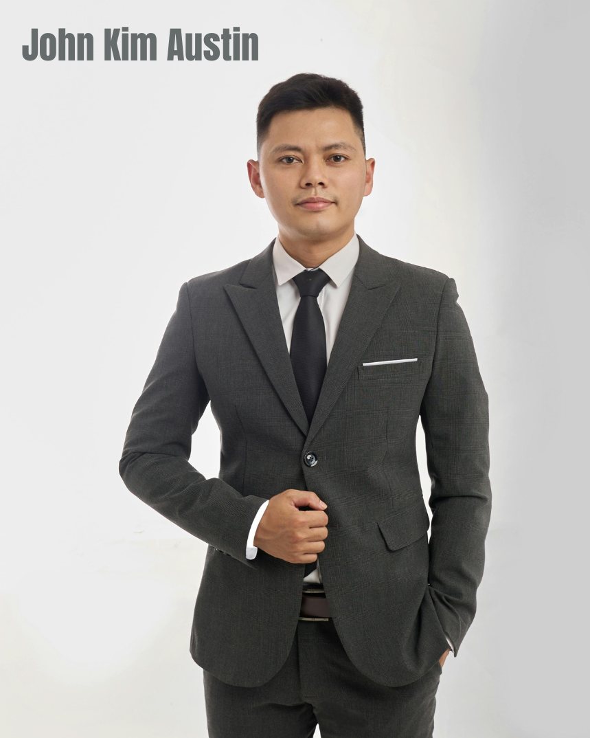 AI-generated illustration of a young man in a charcoal suit and dark tie standing against a white backdrop, captioned John Kim Austin