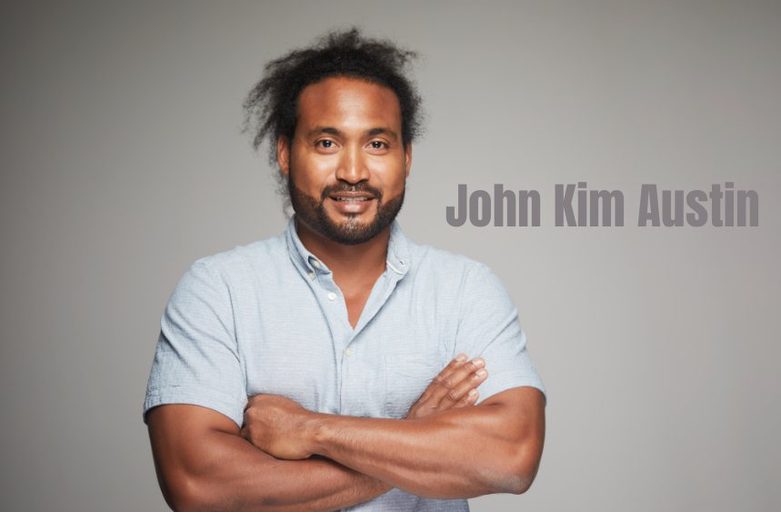 AI-generated illustration of a man with curly hair and a beard in a light shirt, arms crossed, captioned John Kim Austin