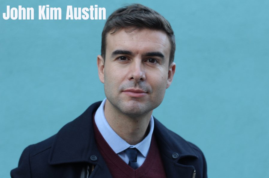 AI-generated illustration of a man in a navy coat, burgundy sweater and tie against a teal wall, captioned John Kim Austin
